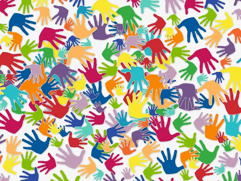 Lots of brightly coloured hands on white background.