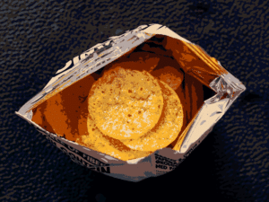 Open pack of crisps viewed from above.