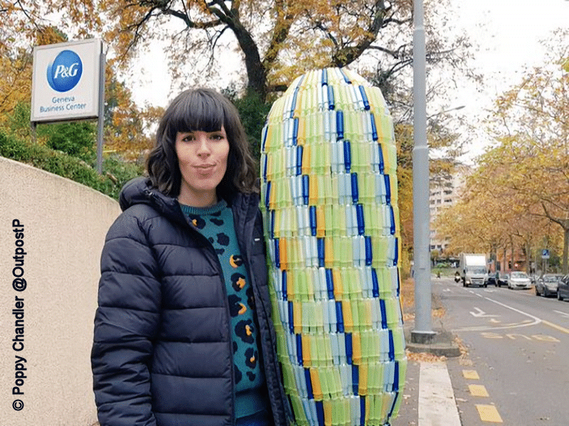 Ellie Daish of #EndPeriodPlastic campaign with giant tampon applicator.