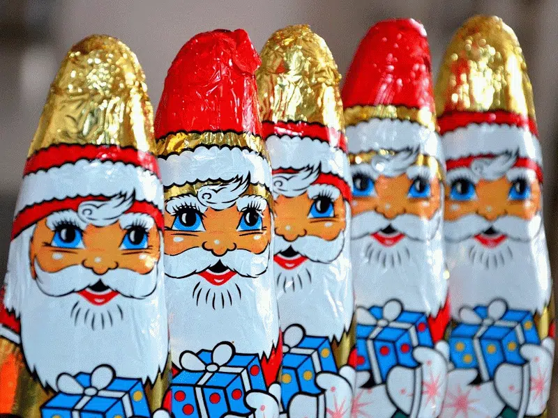 Foil-covered chocolate Father Christmas figures.
