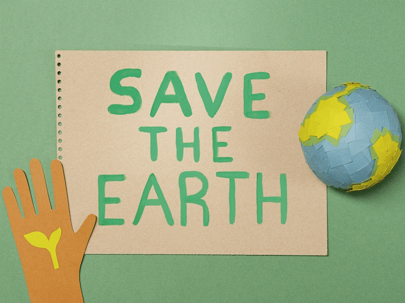 Save the Earth written in green on brown background.